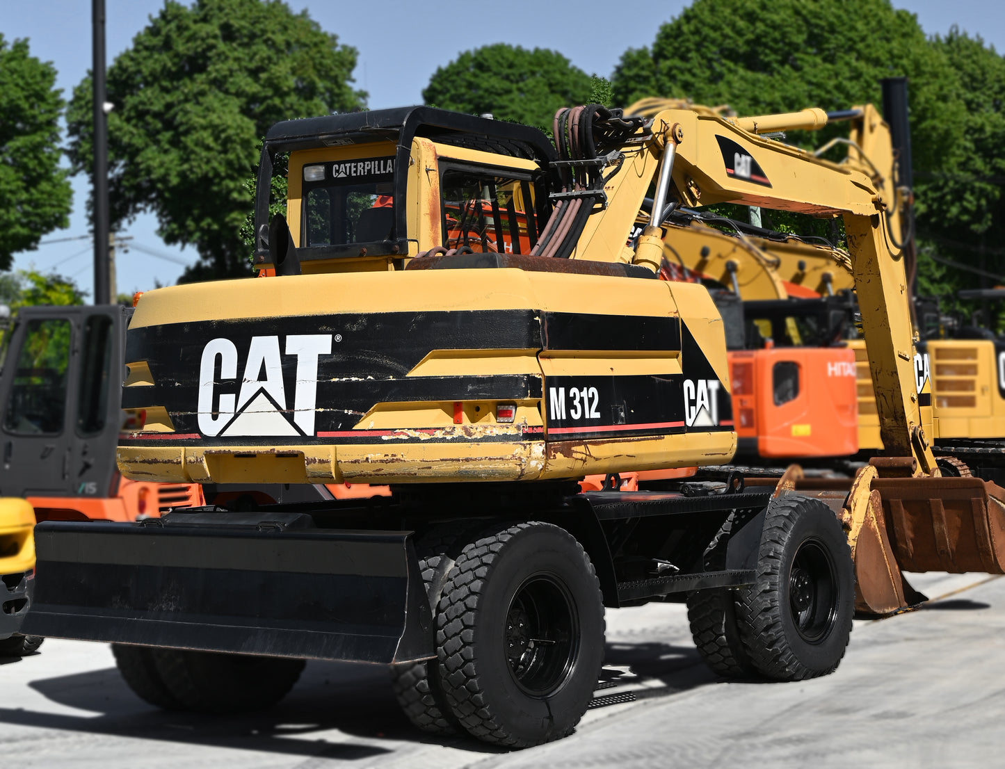 Caterpillar M312 Wheeled Excavator