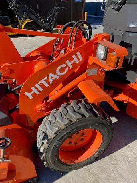 TCM L3-2 / Hitachi LX15 Wheel loader / Power sweeper