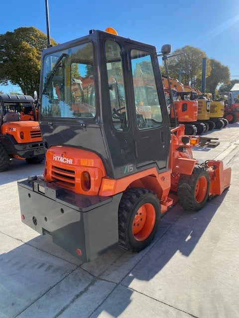 TCM L3-2 / Hitachi LX15 Wheel loader / Power sweeper