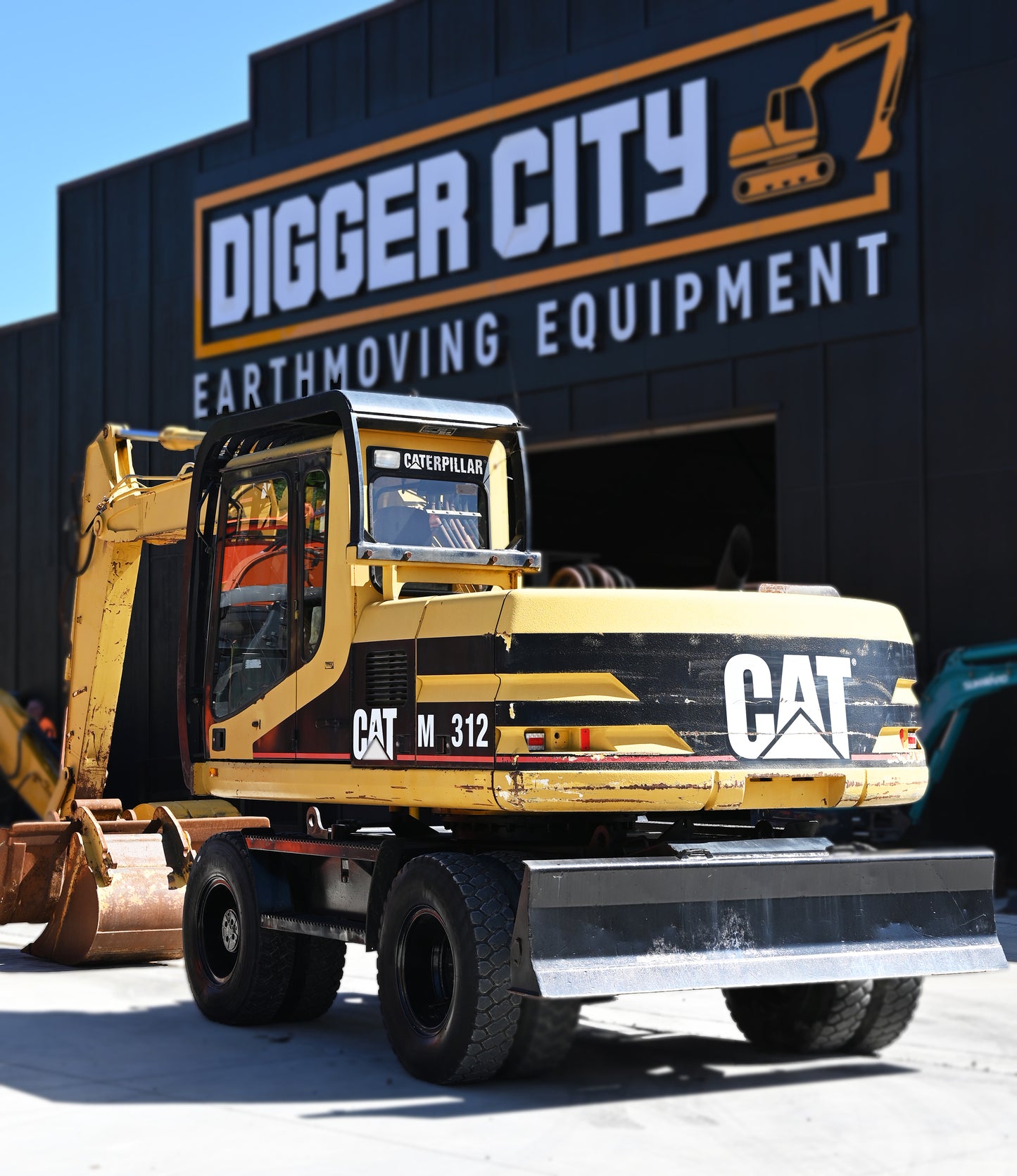 Caterpillar M312 Wheeled Excavator